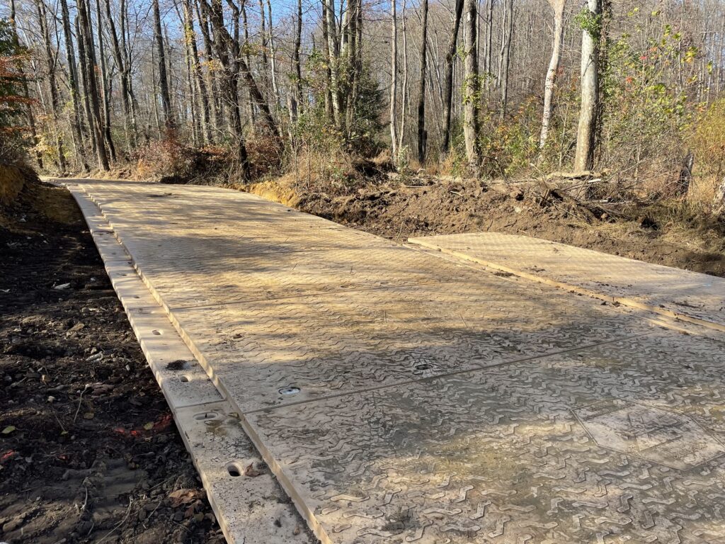 Composite-mat-road-sewer-line-repair