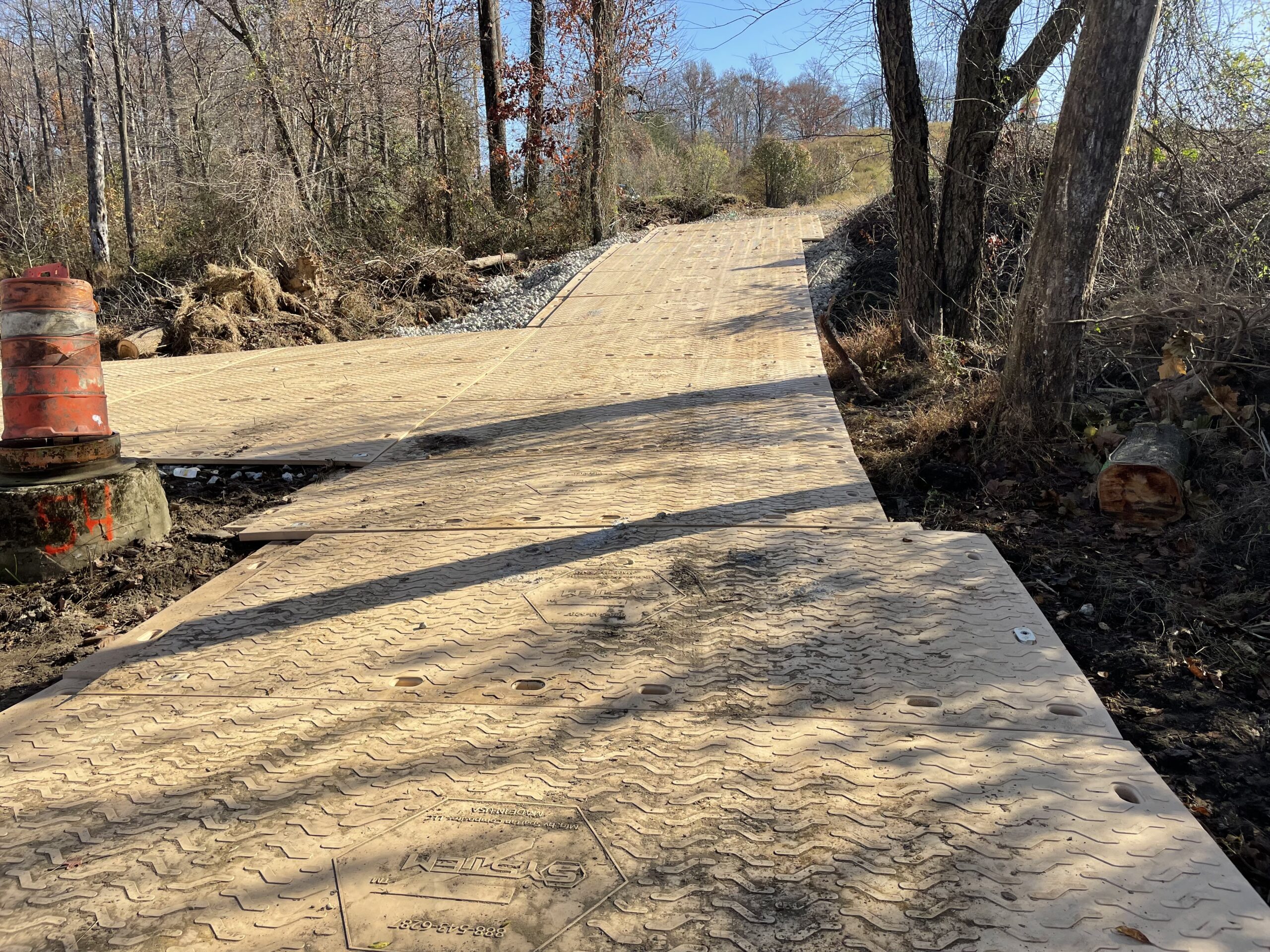 Composite-mat-road-sewer-line-repair