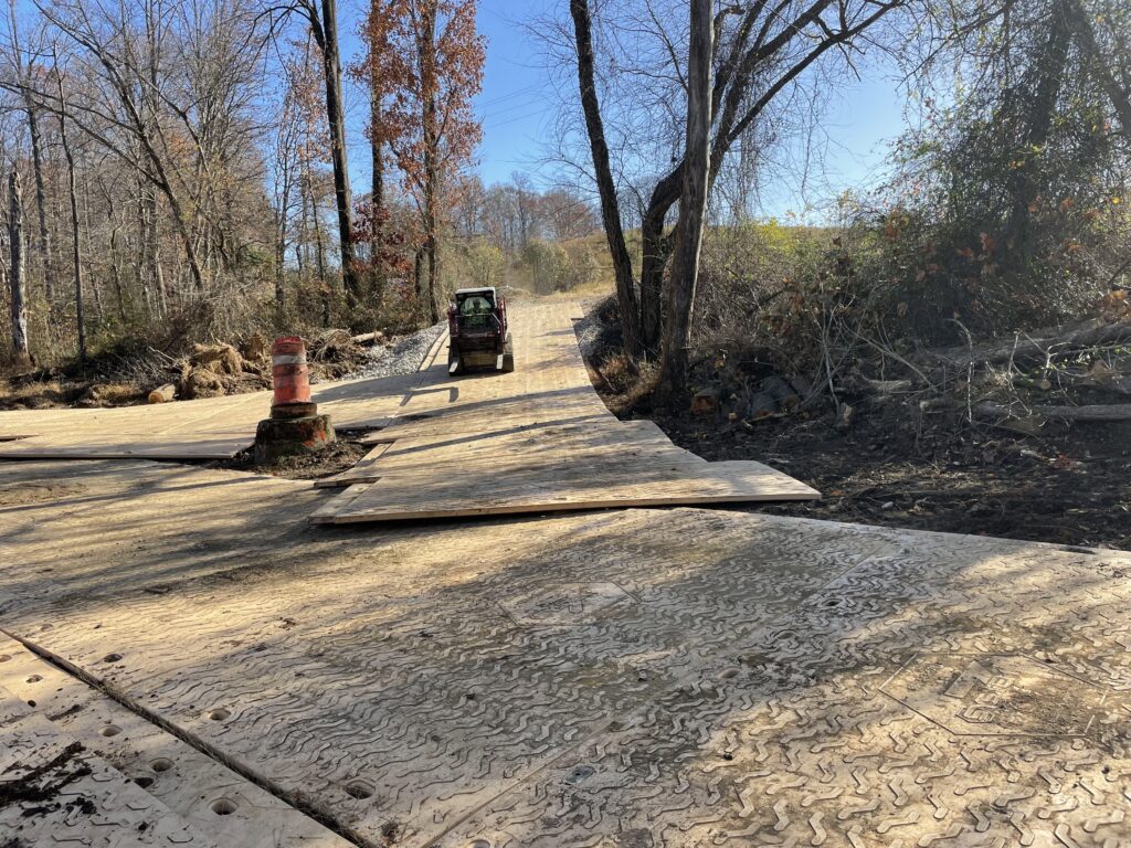 Composite-mat-road-sewer-line-repair