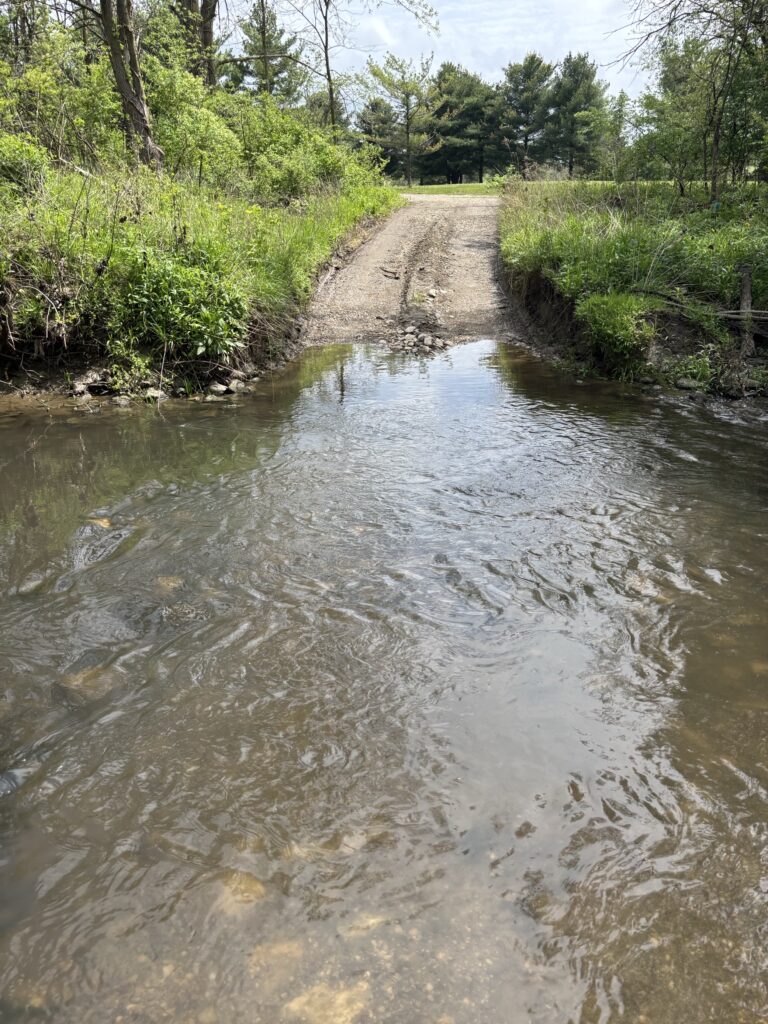 stream crossing created with crane mats and composite mats