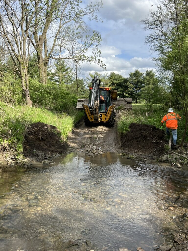 stream crossing created with crane mats and composite mats