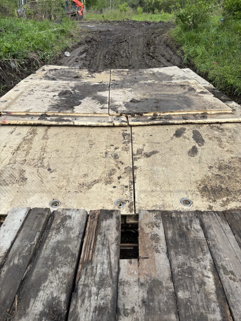 stream crossing created with crane mats and composite mats