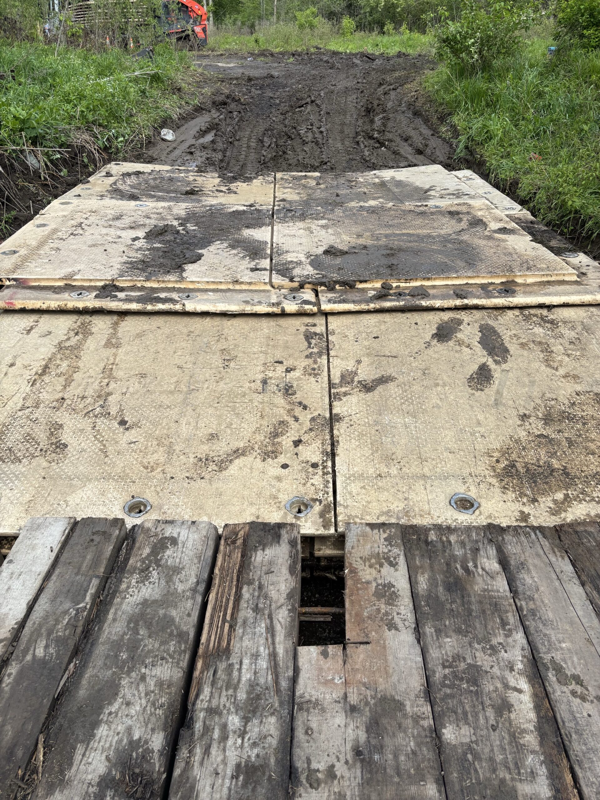 stream crossing created with crane mats and composite mats