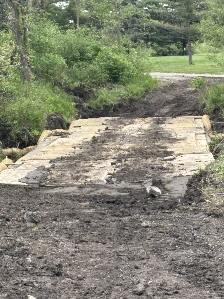 stream crossing created with crane mats and composite mats